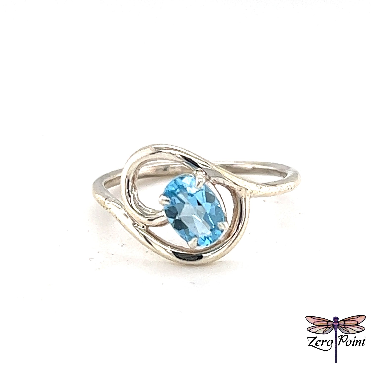 Faceted Oval Cut Blue Topaz Ring - Zero Point Crystals